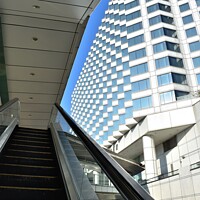 Buy canvas prints of Escalator with building background by Stan Lihai