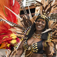 Buy canvas prints of Exotic street parade dancer by Giles Rocholl