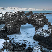 Buy canvas prints of Blue rock arch seascape Iceland by Giles Rocholl