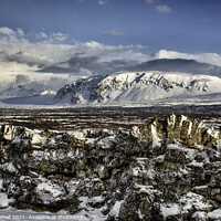 Buy canvas prints of Snowy mountain Thingvellir Iceland by Giles Rocholl