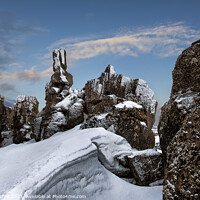 Buy canvas prints of Snowy rocks Thingvellir Iceland by Giles Rocholl
