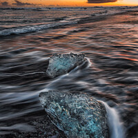 Buy canvas prints of Sunset and stunning sea ice Jokulsarlon Iceland by Giles Rocholl