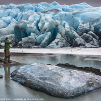 Buy canvas prints of Photographer exploring Iceland by Giles Rocholl