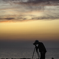 Buy canvas prints of Photographer silhouette at sunset by Giles Rocholl