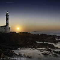Buy canvas prints of Lighthouse and sunset Menorca Spain by Giles Rocholl