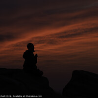 Buy canvas prints of Praying monk at sunrise by Giles Rocholl
