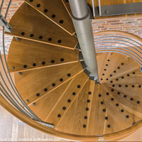 Buy canvas prints of Abstract wooden spiral stair case by Giles Rocholl