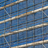 Buy canvas prints of Building scaffolding abstract art by Giles Rocholl