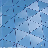 Buy canvas prints of Triangular glass abstract building by Giles Rocholl