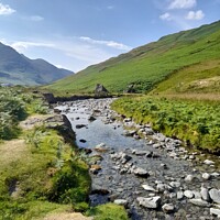 Buy canvas prints of A calm Stream At Honnister Pass, Cumbria by Natasha Fletcher