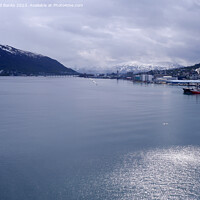 Buy canvas prints of Tromso, Norway - A flash of sunlight by Phil Banks