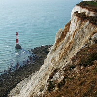Buy canvas prints of Beachy Head Cliffs and Lighthouse  by Phil Banks