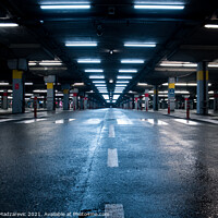 Buy canvas prints of Neon lighted reflective garage by Mihajlo Madzarevic