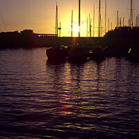 Buy canvas prints of Sunset sailing boats  by Raymond Evans