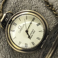 Buy canvas prints of Antique Omega fob watch by Raymond Evans