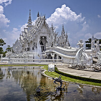 Buy canvas prints of Wat Rong Khun by Raymond Evans