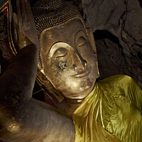 Buy canvas prints of Reclining Buddha by Raymond Evans