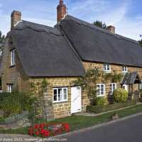 Buy canvas prints of Thatched Cottage UK by Raymond Evans