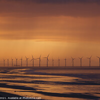 Buy canvas prints of A sunset over the Teesside wind farm by Dave Cocks