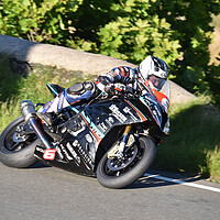 Buy canvas prints of IOM TT road races, Micheal Dunlop racing by Russell Finney