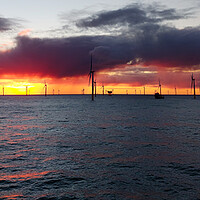 Buy canvas prints of Sunrise - Merkur wind farm Germany by Russell Finney