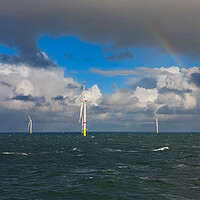 Buy canvas prints of Rainbows in the wind turbines by Russell Finney