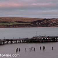 Buy canvas prints of Swanage Piers at Sunset by Stuart Wyatt