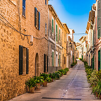 Buy canvas prints of Old town of Alcudia street by Alex Winter