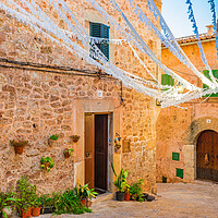 Buy canvas prints of Charming Rustic Village in Mallorca by Alex Winter