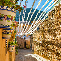 Buy canvas prints of Charming Stone Alleyways of Valldemossa, Mallorca  by Alex Winter