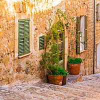 Buy canvas prints of Idyllic view of an street in the old village Deia on Mallorca by Alex Winter
