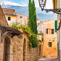 Buy canvas prints of Narrow alley at Soller by Alex Winter