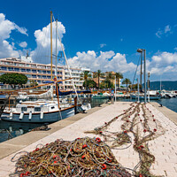 Buy canvas prints of Fisher net at fishing harbor port of Sa Coma, cala by Alex Winter