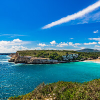 Buy canvas prints of Idyllic panoramic view the coastline bay and beach of Cala Romantica by Alex Winter