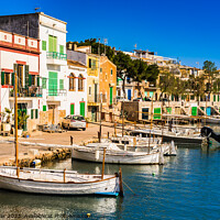 Buy canvas prints of colorful houses of Portocolom on Mallorca by Alex Winter