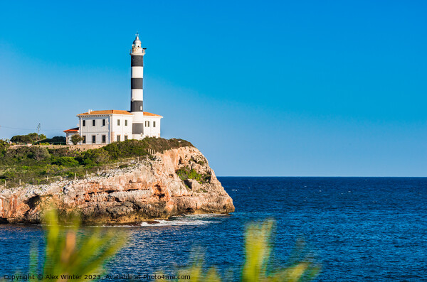 lighthouse at coast cape in Portocolom Picture Board by Alex Winter