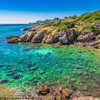 Buy canvas prints of Idyllic view of the seaside in Cala Rajada by Alex Winter