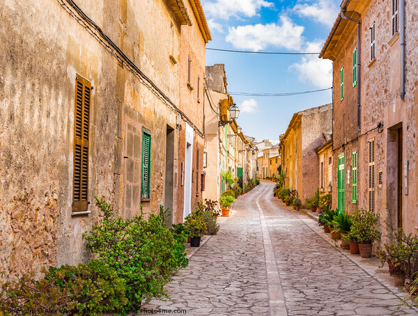 Idyllic street in the mediterranean village Picture Board by Alex Winter