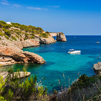 Buy canvas prints of Idyllic bay with luxury yacht at the coast Majorca by Alex Winter