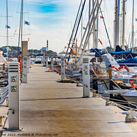 Buy canvas prints of Sailing boats moored at the pier in Portocolom by Alex Winter