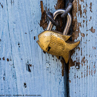 Buy canvas prints of Close-up of closed padlock in fish design by Alex Winter