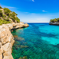 Buy canvas prints of Serenity of Cala Llombards by Alex Winter