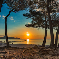 Buy canvas prints of Idyllic view of sunrise at coast Alcudia Bay by Alex Winter