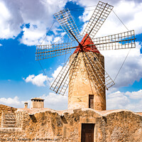Buy canvas prints of View of old rustic traditional windmill by Alex Winter