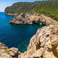 Buy canvas prints of Rocky coastline cliffs, Spain by Alex Winter