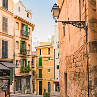 Buy canvas prints of Street in the old town of Palma de Mallorca, Spain by Alex Winter