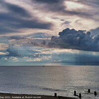 Buy canvas prints of Majestic Storm Clouds Roll Over Hunstanton Beach by Martin Day