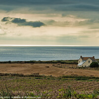 Buy canvas prints of Majestic Cornish Cottage Overlooking a Scenic Hori by Martin Day