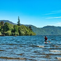 Buy canvas prints of Paddle Boarding on Derwent Water  by Martin Day