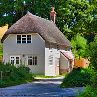 Buy canvas prints of Idyllic Thatched Cottage in Dorset by Martin Day